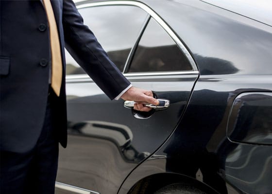 Professional chauffeur-driven car ready for a client pickup